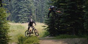 Bas van Steenbergen and Matt Macduff jumping mountain bikes